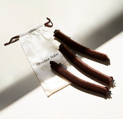 Brown Velvet Set heatless blowout rods with satin pouch in warm sunlight