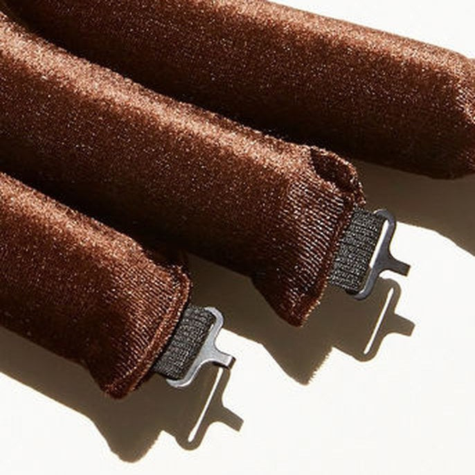 Brown velvet blowout rods with the metal clip that attaches each rod